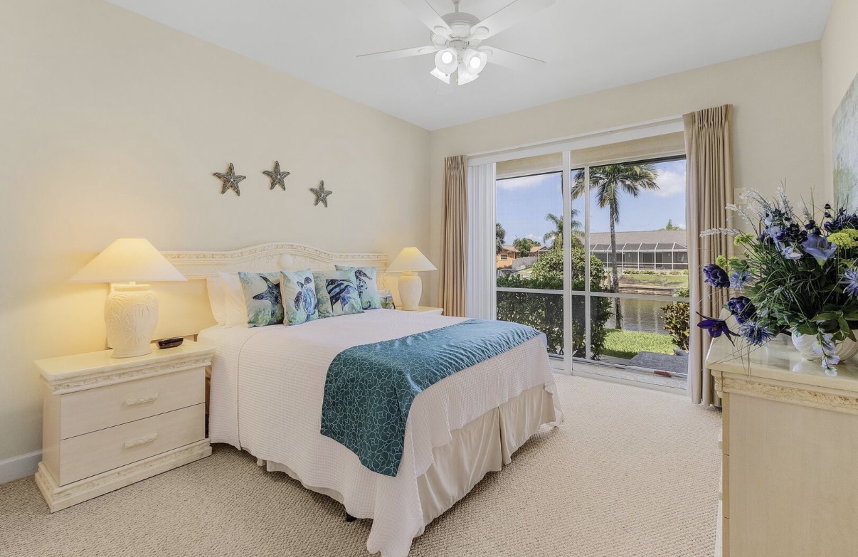 Guest bedroom with canal view at the Cape Coral home