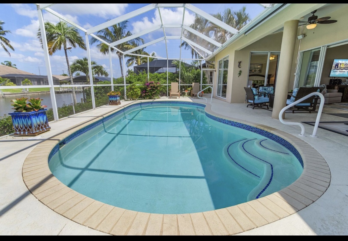 Screened pool overlooking the canal in Cape Coral